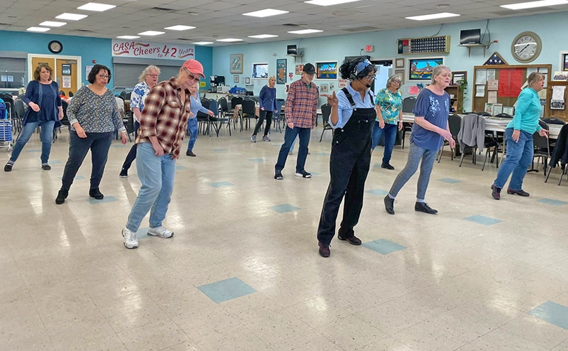 seniors at CASA PV following an instructor doing various dance exercises