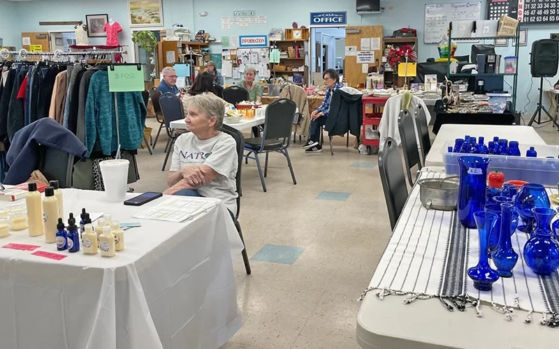 Tables set up with various things for sale at Casa Prescott Valley